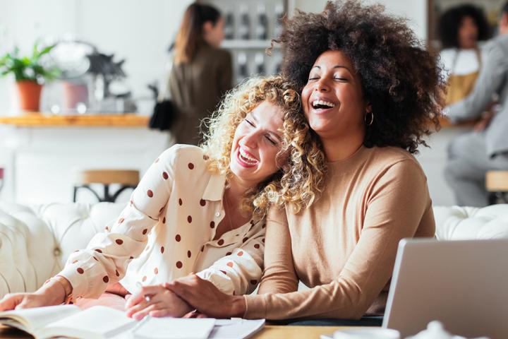 Team members meeting in a break out area